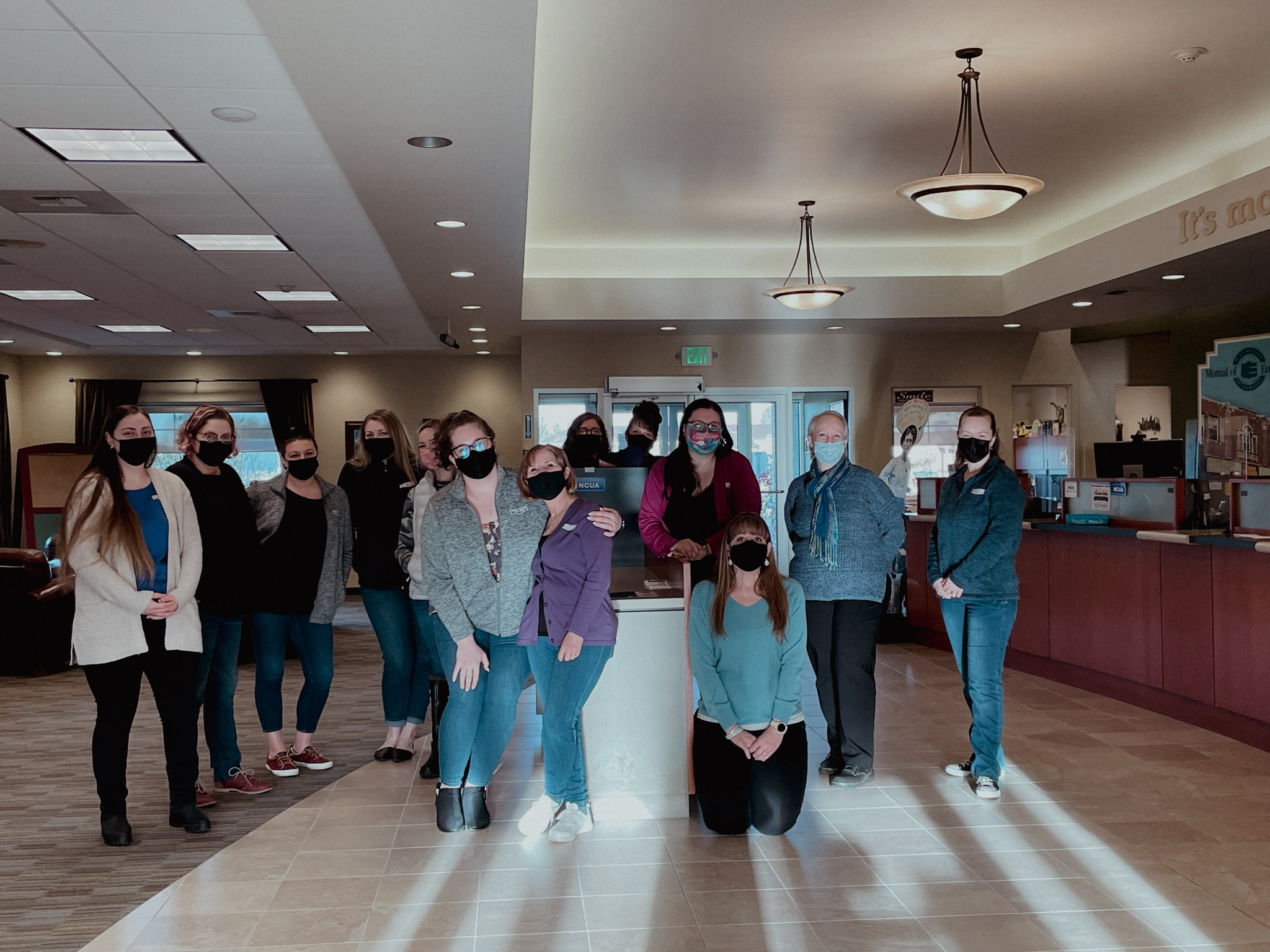 group of employees in credit union lobby